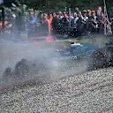 ZANDVOORT, NETHERLANDS - AUGUST 30: Lance Stroll of Canada driving the (18) Aston Martin F1 Team AMR25 Mercedes crashes out during qualifying ahead of the F1 Grand Prix of Netherlands at Circuit Zandvoort on August 30, 2025 in Zandvoort, Netherlands. (Photo by Simon Galloway/LAT Images)