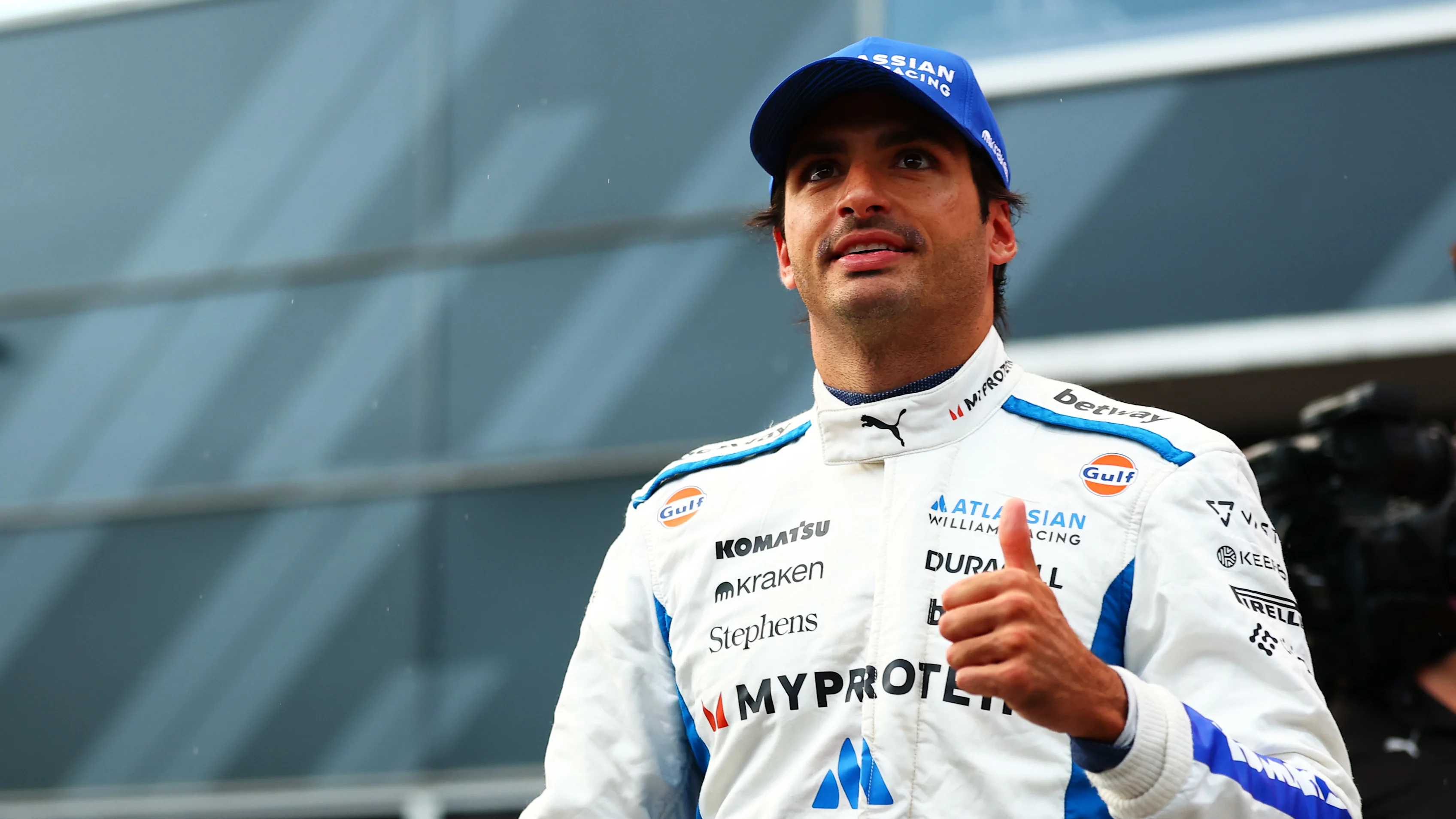 BAKU, AZERBAIJAN - SEPTEMBER 20: Second placed qualifier Carlos Sainz of Spain and Williams gives a thumbs up in parc ferme during qualifying ahead of the F1 Grand Prix of Azerbaijan at Baku City Circuit on September 20, 2025 in Baku, Azerbaijan. (Photo by Bryn Lennon - Formula 1/Formula 1 via Getty Images)