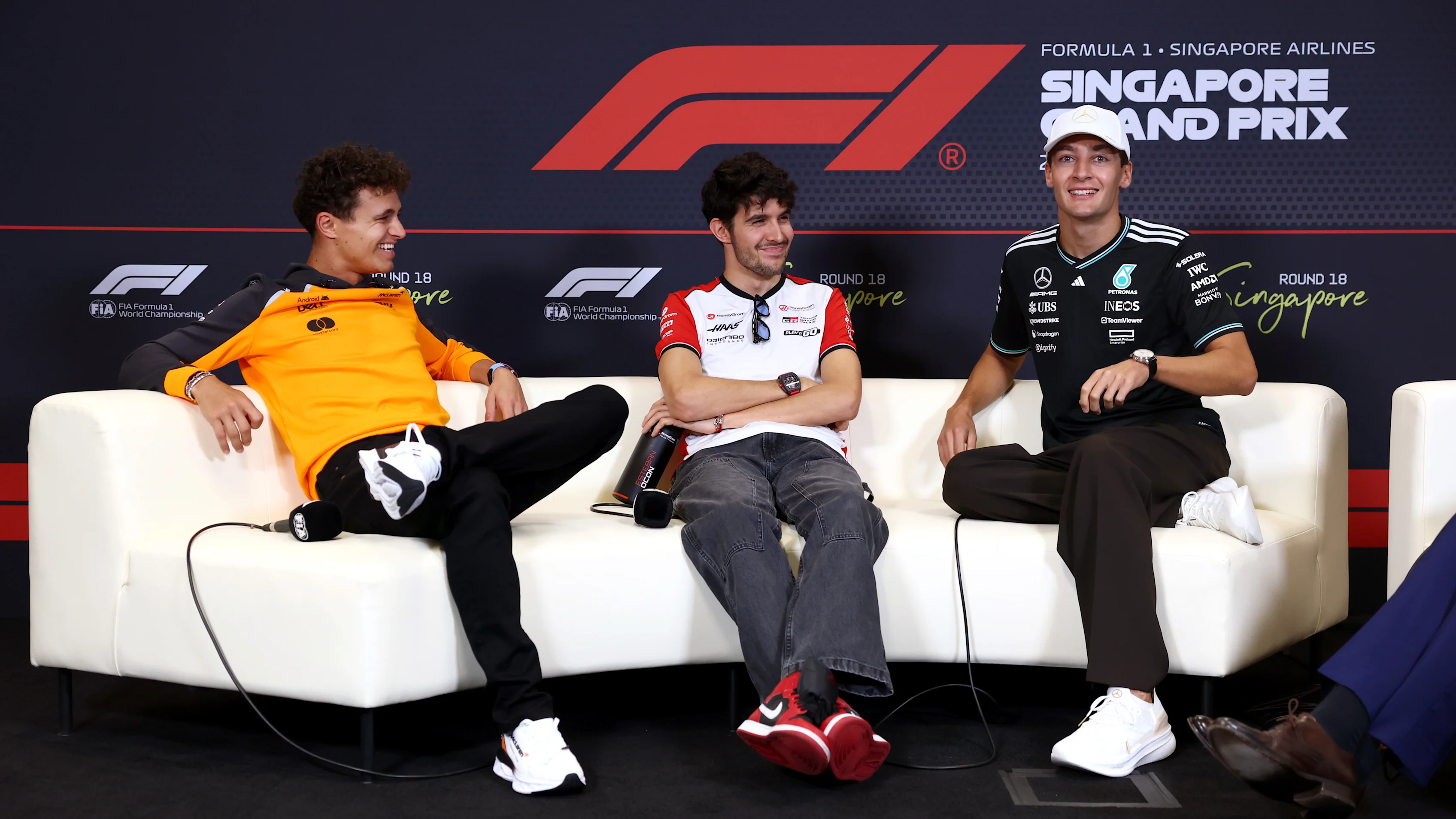 Singapur, Singapur - 02 de octubre: Lando Norris de Gran Bretaña y McLaren, Esteban Ocon de