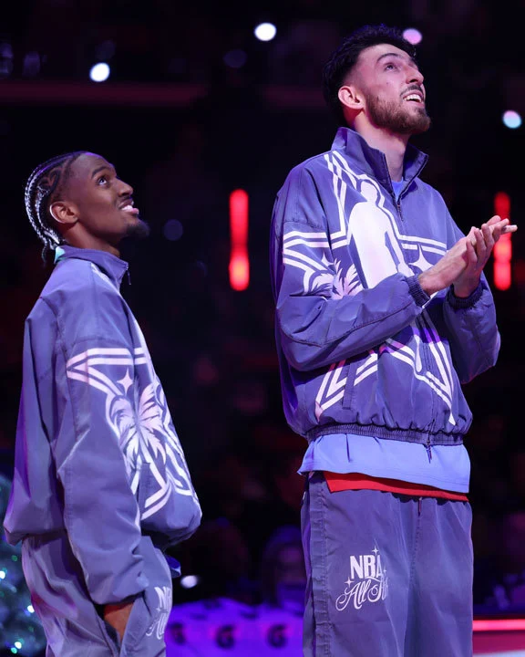 Tyrese Maxey y Chet Holmgren